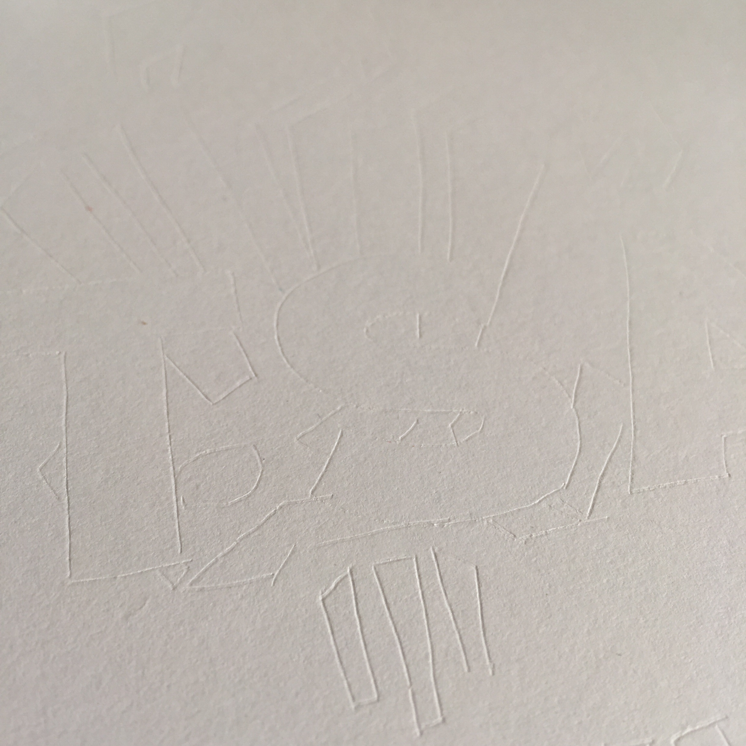 Tracing the outline to create the indentation on the card