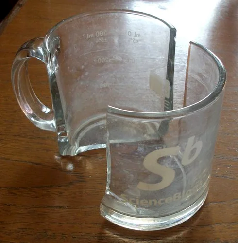 An ominous portent of things to come -- my beloved ScienceBlogs mug suddenly made a cracking noise one day and split neatly in half. Read down to see what this was, err, portenting... is that a word? Image: Darren Naish.