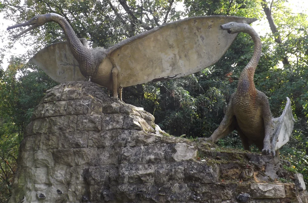The two large Crystal Palace pterosaurs represent the species known to Owen and Hawkins as Pterodactylus cuvieri (though the possibility that more than one species is represented is raised by Owen’s remarks in the accompanying guide). Unfortunately, one of the models is now badly broken. The two smaller pterosaur models are not currently on display and have had a really unfortunate history: they’ve been vandalised, broken and stolen several times. Image: Darren Naish.