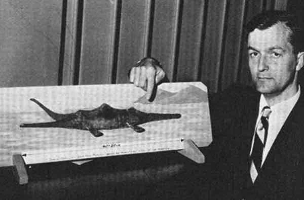 Tim Dinsdale with his own reconstruction of the Loch Ness Monster (a clay model, held in place on a painted wooden board). I presume this photo was taken on the set of the BBC Panorama studio. Image: (c) Tim Dinsdale.