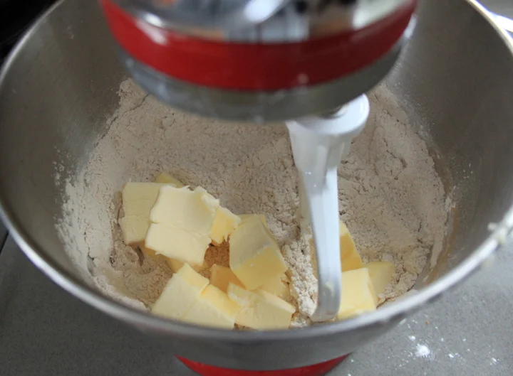 Mix the cold butter into the dry ingredients.