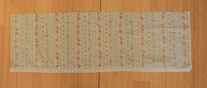 Skirt rectangle hemmed with lace sewn in.