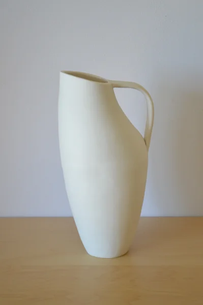 Thrown and altered pitcher