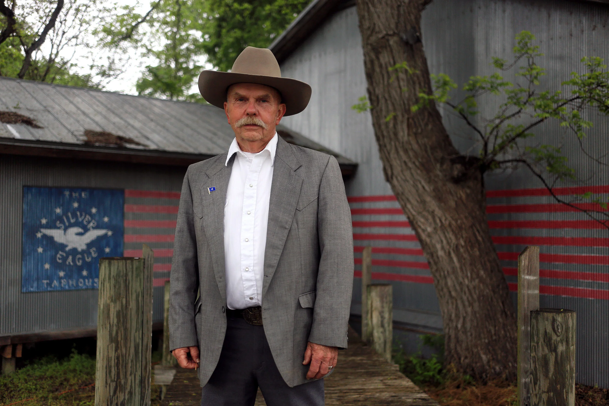 John Jarneke, president of the Republic of Texas, lamented taking his tie off before he was photographed outside the Silver Eagle Taphouse in McQueeny, TX. The 72-year-old retired construction contractor from Fredericksburg has a vision of Texas where “people will be friendlier and less worried” with a smaller government, less police and lower taxes.