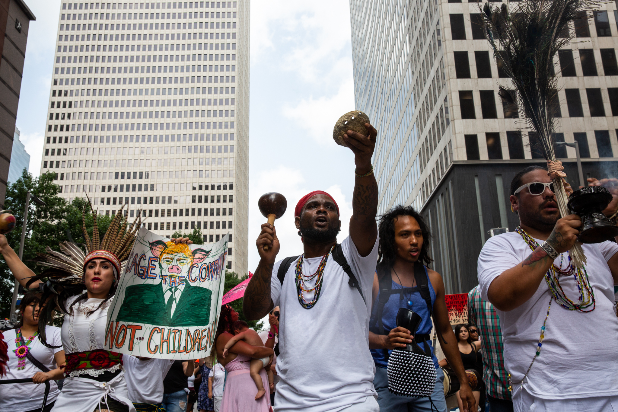 Demonstrators protest against the separation of immigrant families at City Hall in Houston, TX.