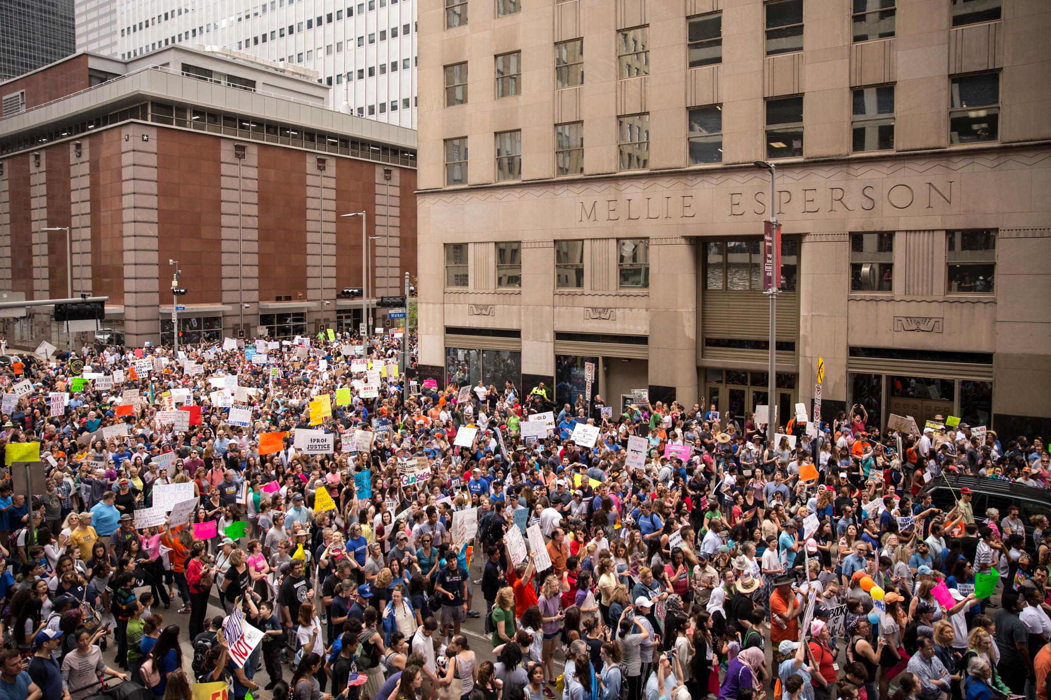 A large crowd moves through downtown for the March For Our Lives rally in Houston, Texas on March 24, 2018.