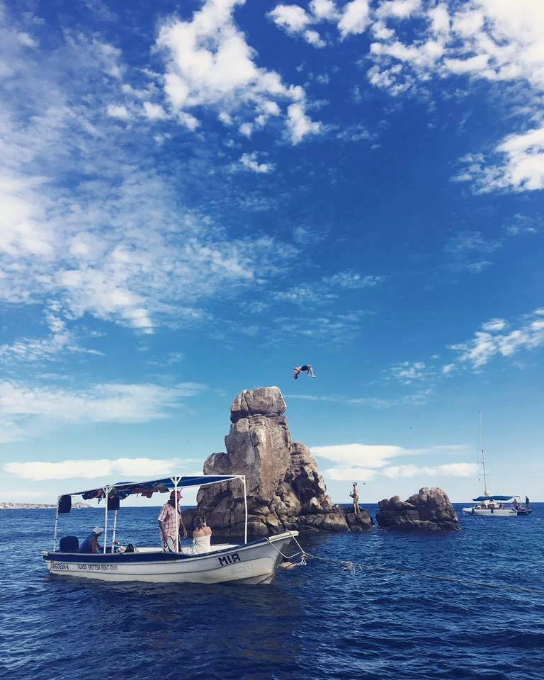 Toni adventuring in Cabo San Lucas, feeling awestruck by all the majesty water has to offer