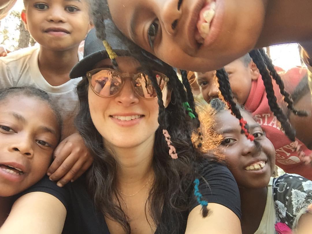 Natasha surrounded by her gorgeous new best friends. Talking braids, love of rice, and H2O, to be sure.