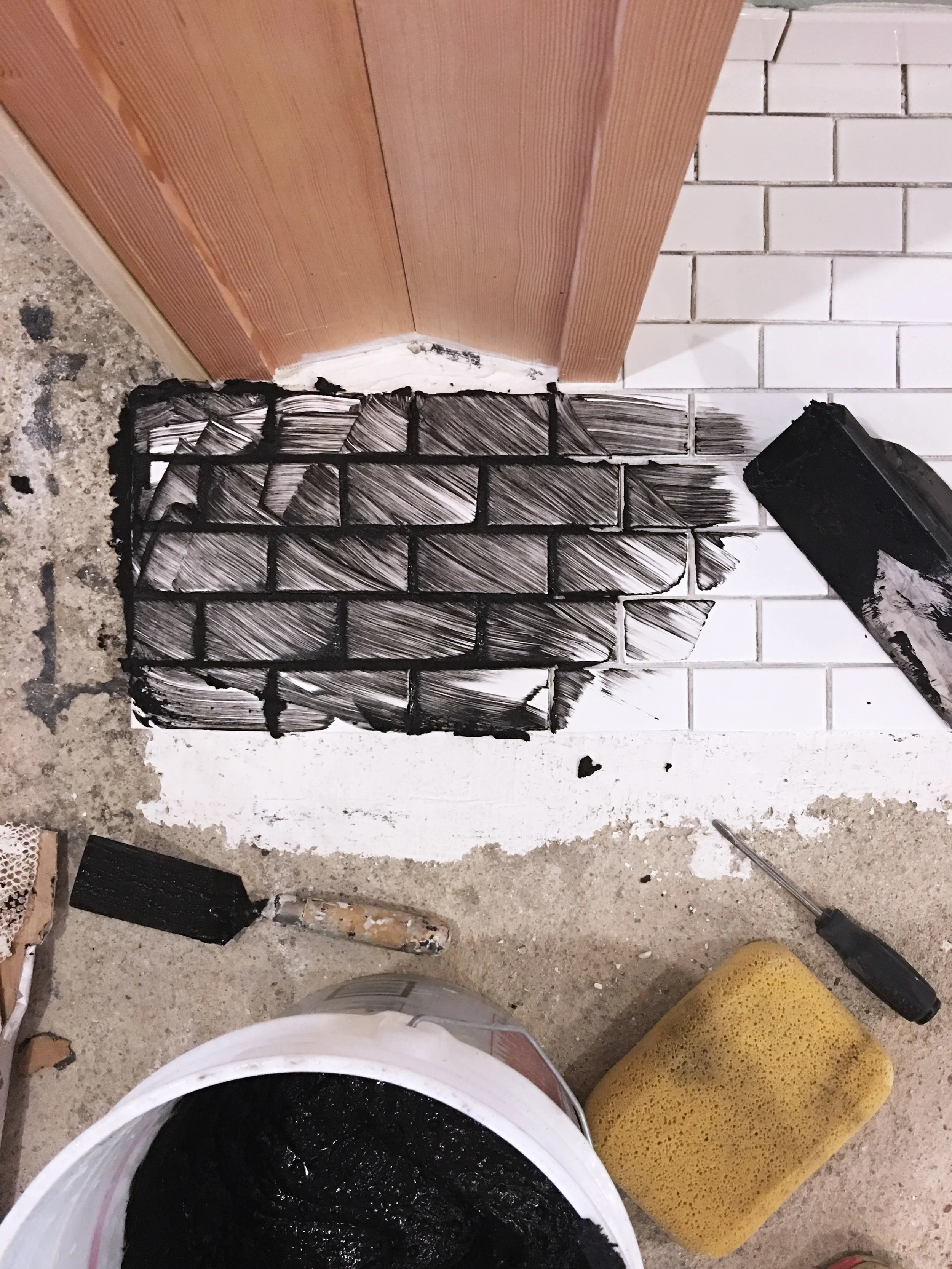 grouting the tile.jpg