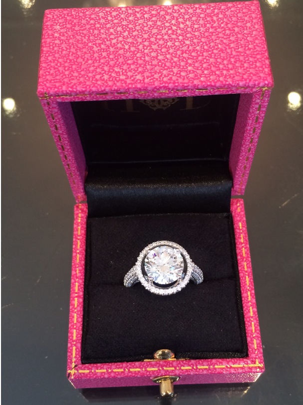 This swoon-worthy ring was a labor of love with over 300 collection-quality side diamonds, meticulously hand-set, to frame this spectacular 3.00ct beauty. 