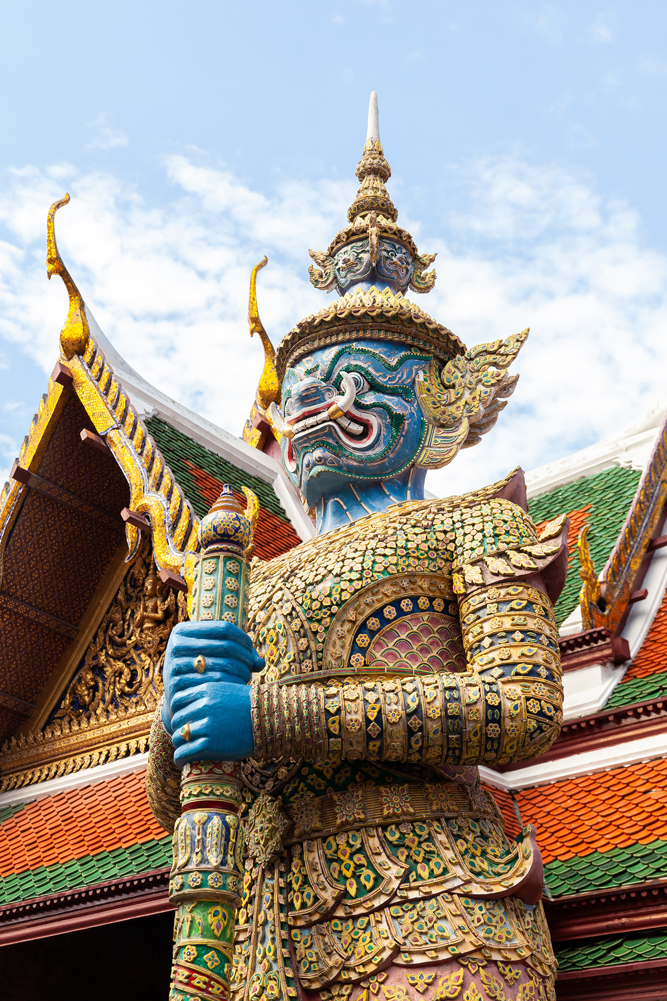A Demon Guardian stands watch, protecting the Emerald Buddha from evil spirits, inside the Grand Palace