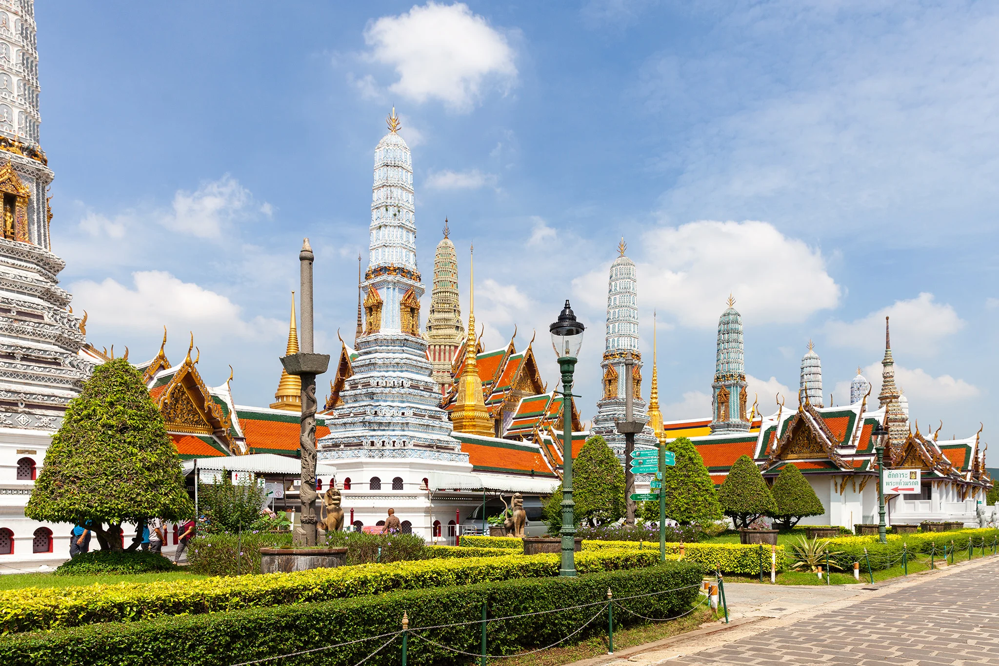 Phra Asadha Maha Chedi, eight towers dedicated to different pillars of Buddhism, inside the Grand Palace