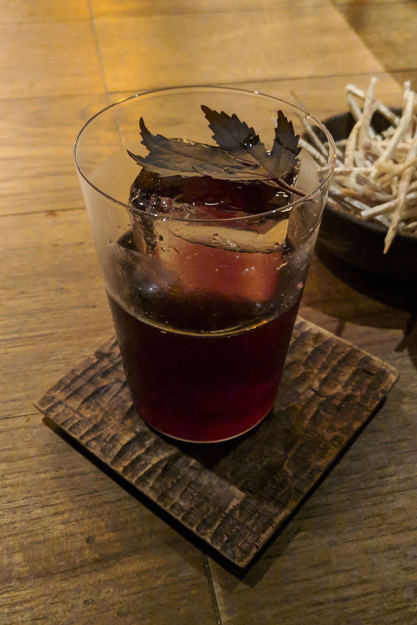 The “Tanuki” cocktail at Thaipioka: Campari, Kyoho Sake, Shisho-infused Bulldog Gin