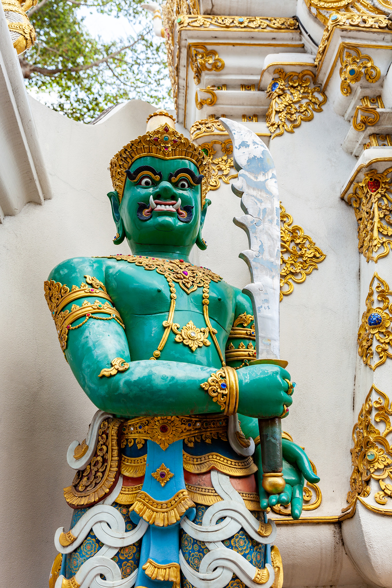 an emerald guard at Wat Chedi Luang
