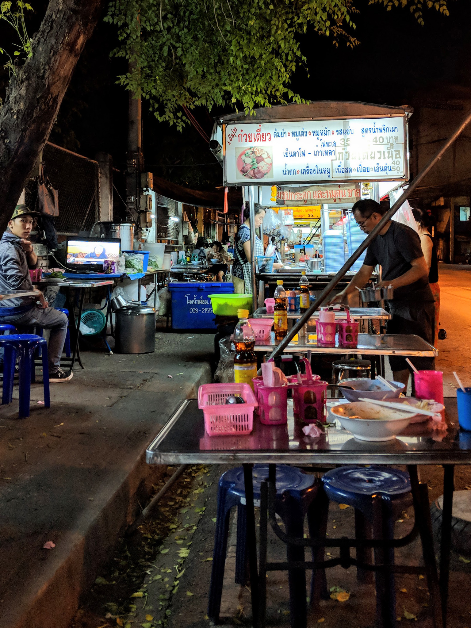 Dinner at a street vendor serving up pork noodles