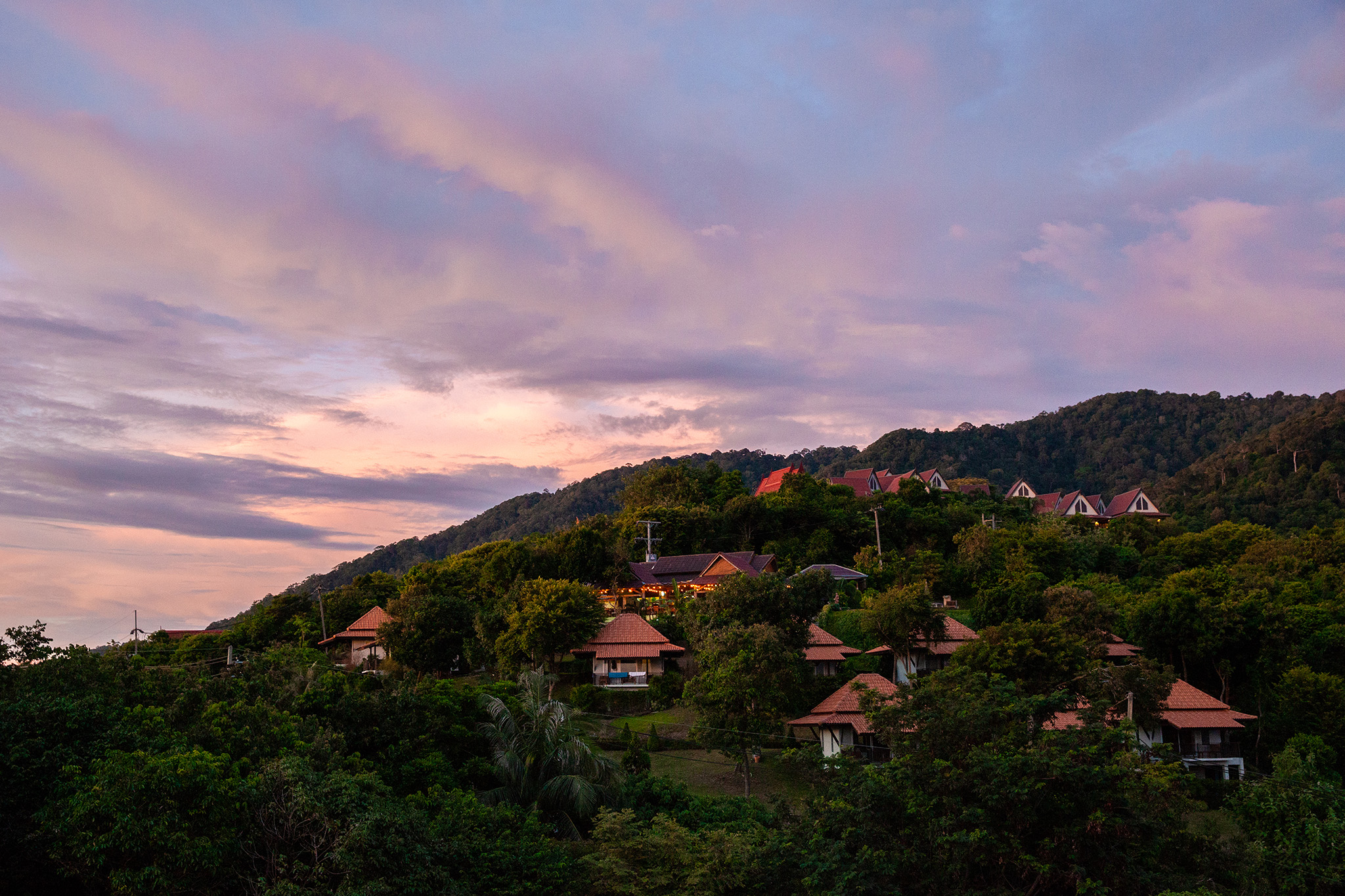 Sunset view of the Kantiang View Resort in the hills behind the Houben Hotel