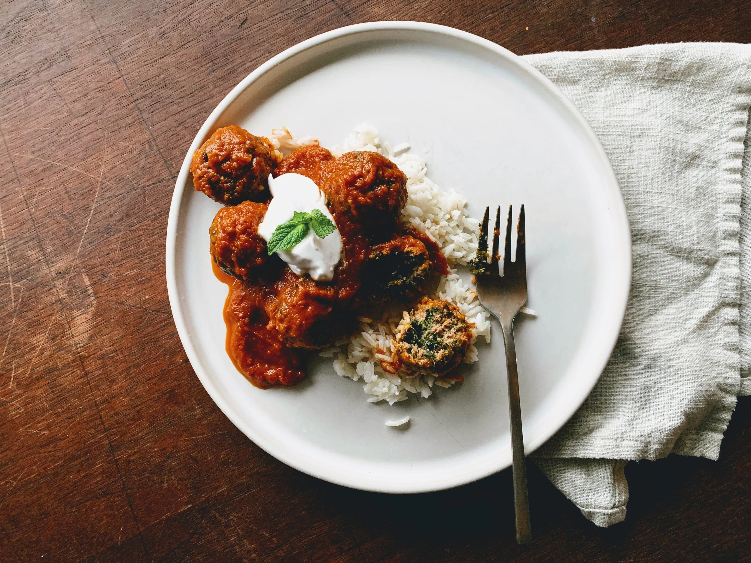 Lamb+and+Spinach+Meatballs+in+Harissa+Tomato+Sauce+with+napkin.jpg