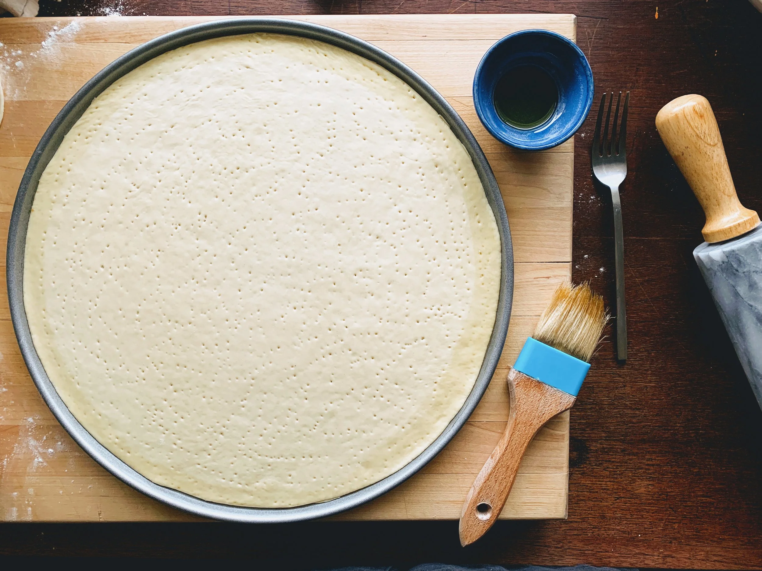 Chicago Thin Crust Pizza Dough in Pan.jpg