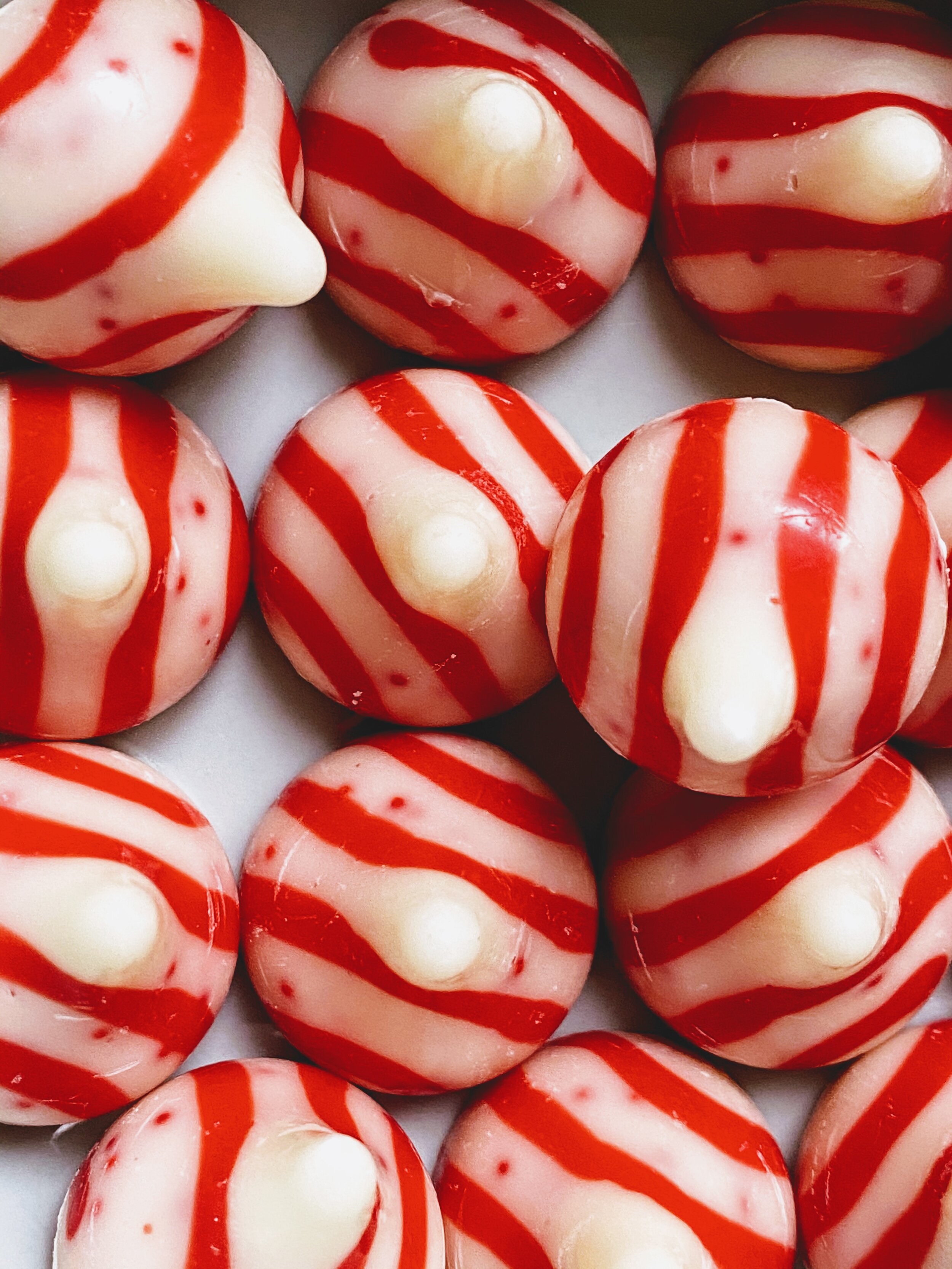 Thumbprint Cookies Two Ways Candy Cane Kisses.jpg