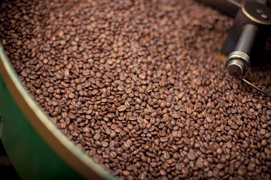 Freshly roasted beans cool before being transferred to storage tins.
