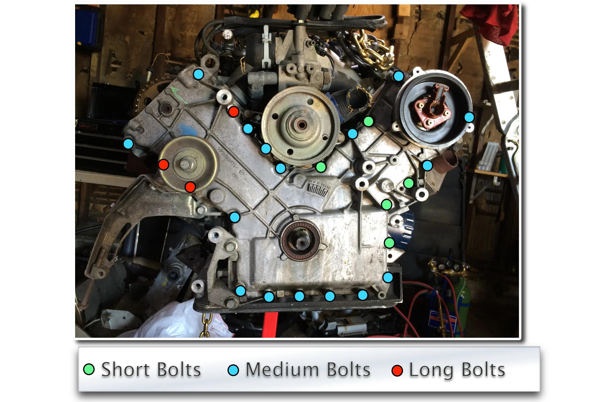 The timing cover is held on with 25 bolts (13mm socket) with a mix of bolt lengths.
