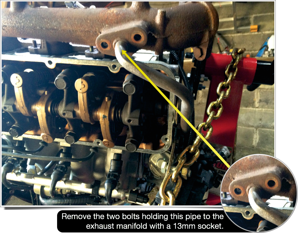 A pipe leading from the exhaust manifold to the lower crankcase needs to be unbolted.