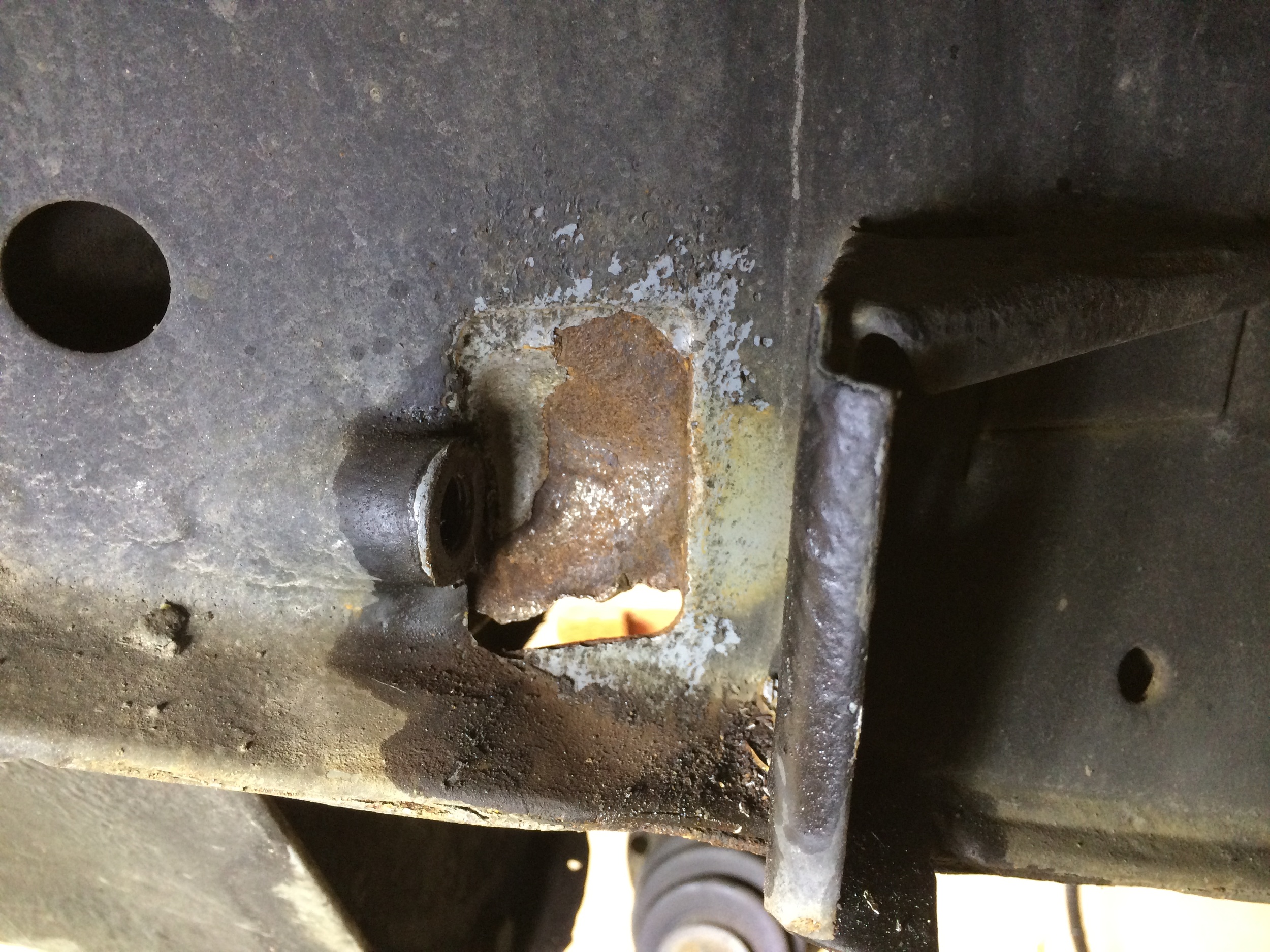 After removing the epoxy, the rust is revealed to be only on the surface, and the metal is still strong.