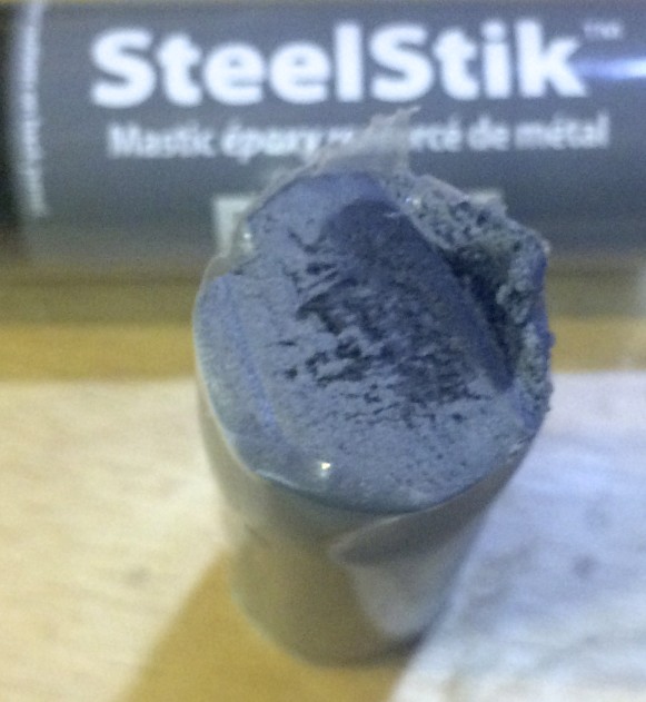 The putty contains two compounds that are mixed together by rolling it around in your fingers.