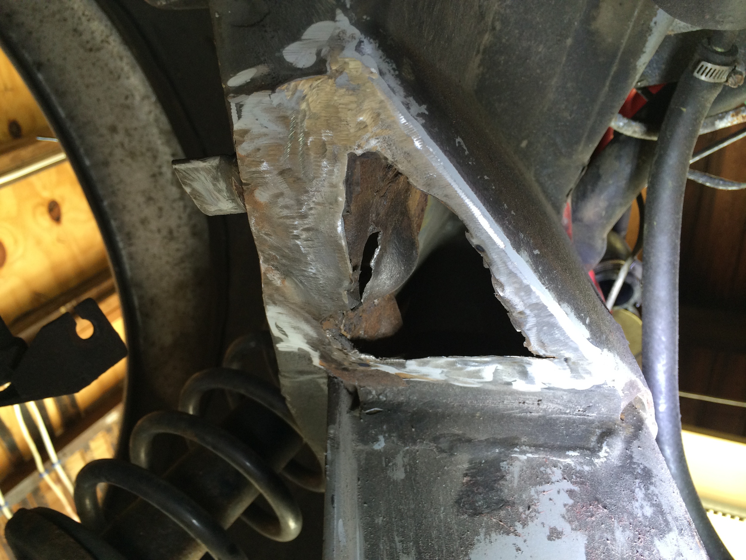 Cleaned up hole on the passenger side.