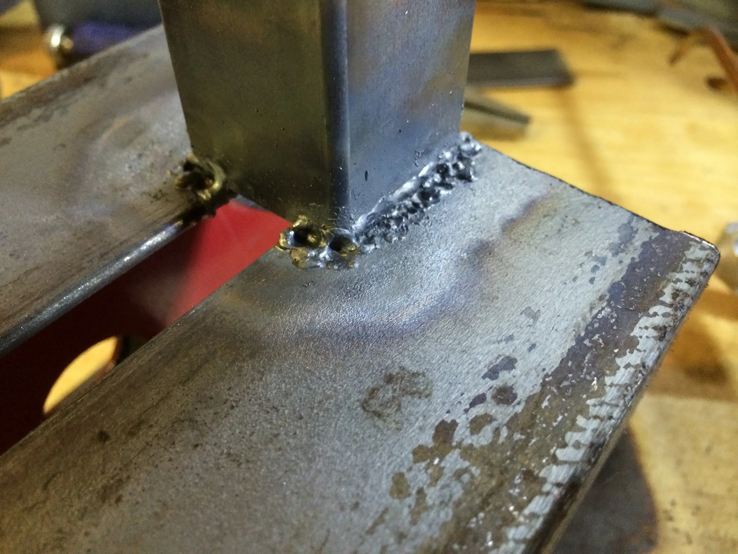 My quite poor welds between the square tubing and the angle iron.