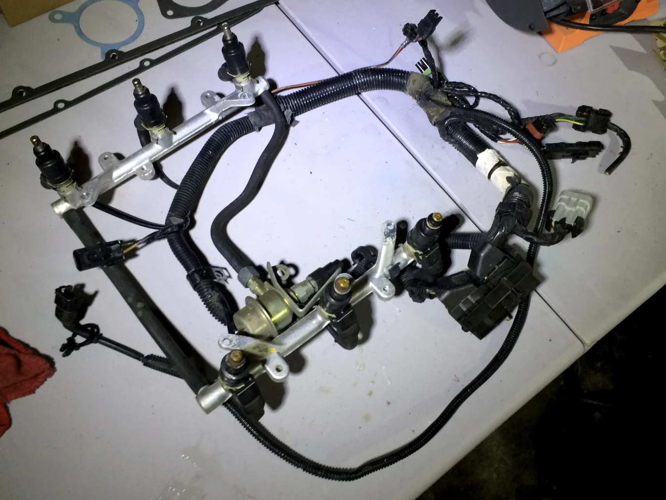 Removed fuel rails, injectors and harness.