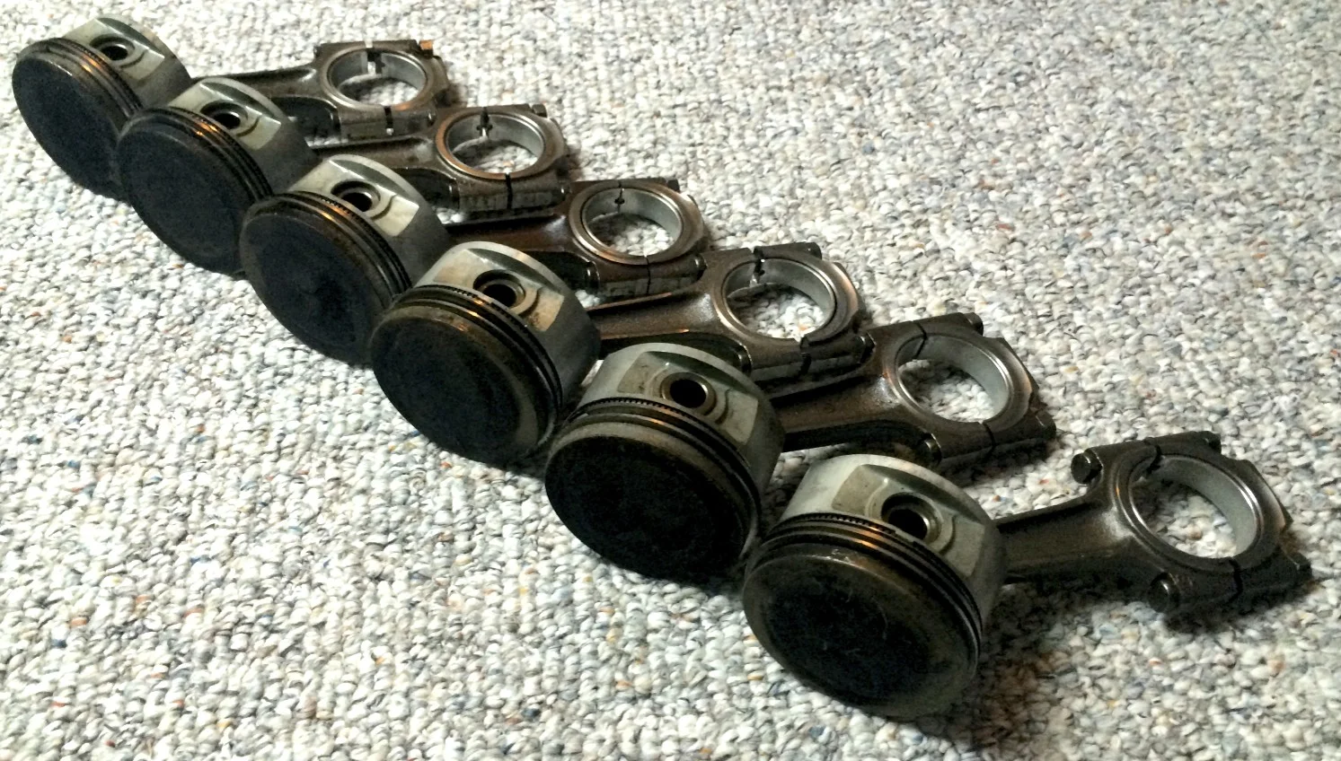 All six pistons removed from the engine and their liners. Really should have labeled these...