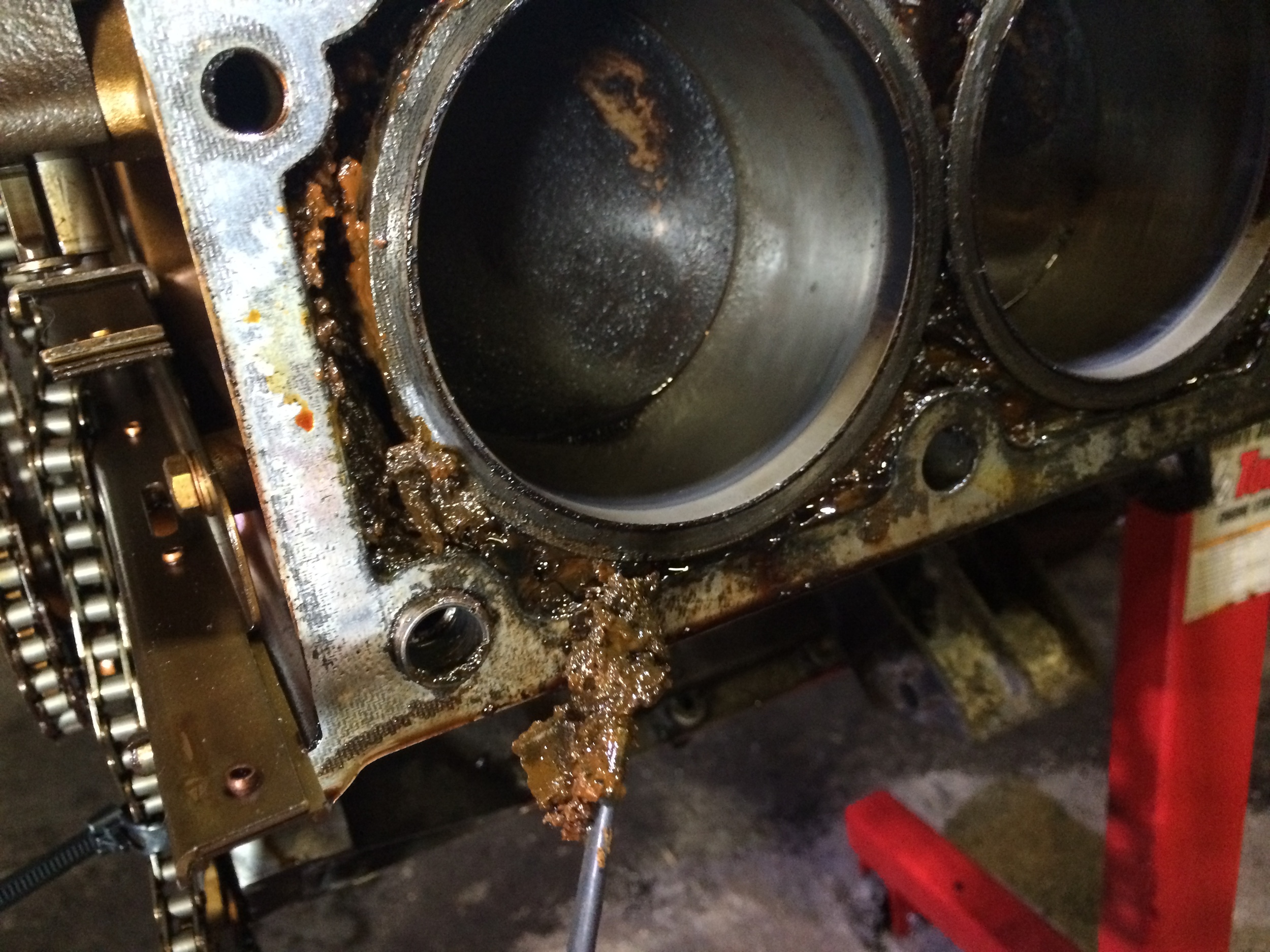 Cleaning out the mud with a pick (bottom of the image)