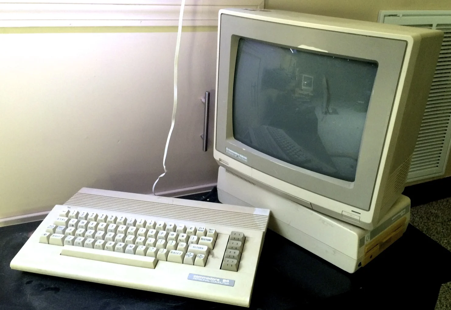 My old Commodore 64C with floppy drive and monitor.