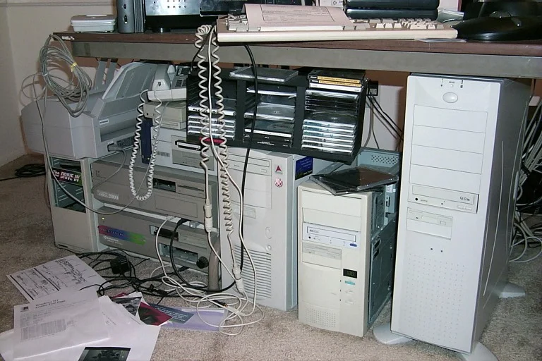 From left to right: Drive In drive tower for the Amiga, two Amiga 2000 computers, DEC Alpha workstation, two Intel based Windows systems. 