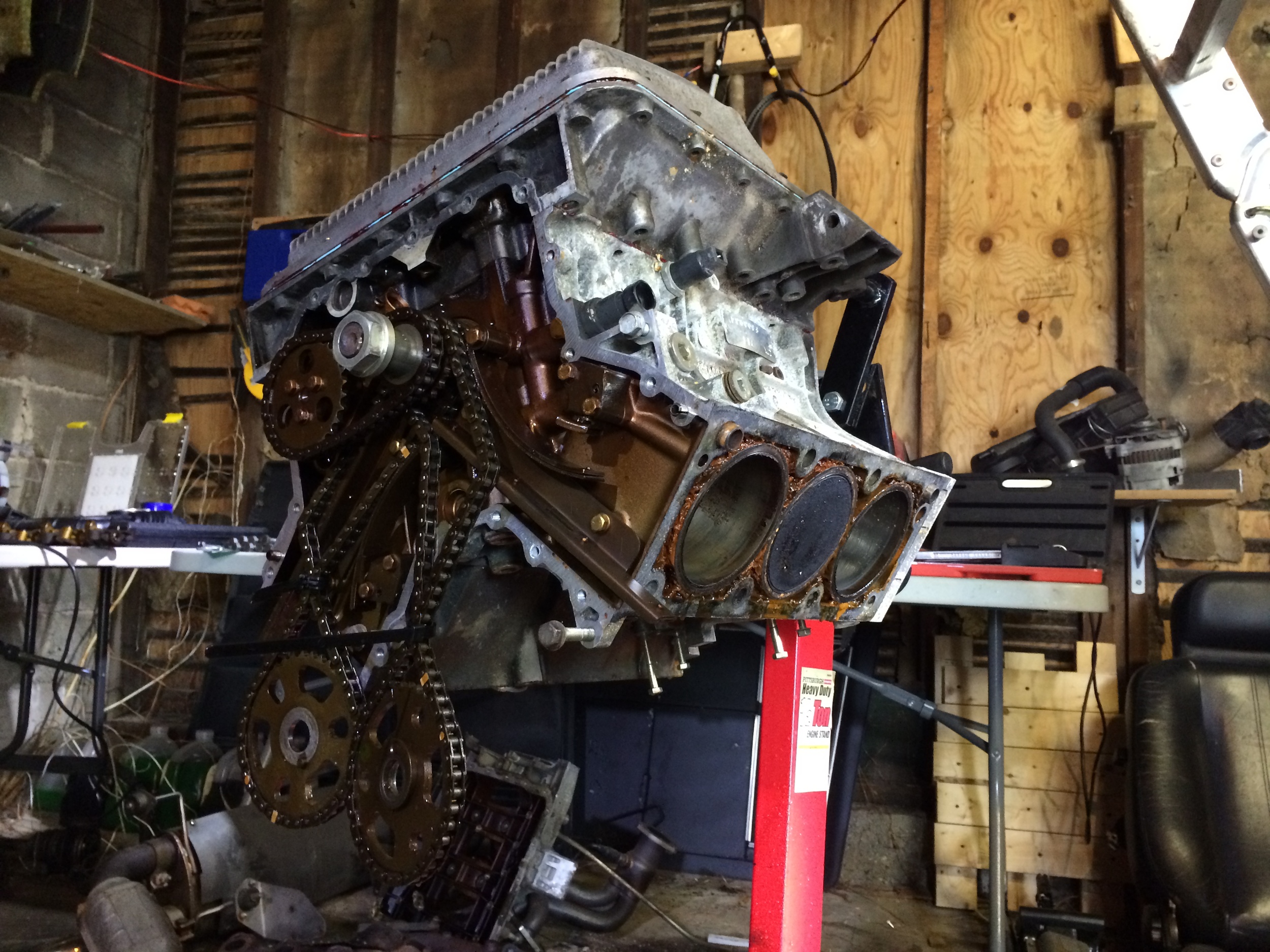 The engine inverted for cleaning.