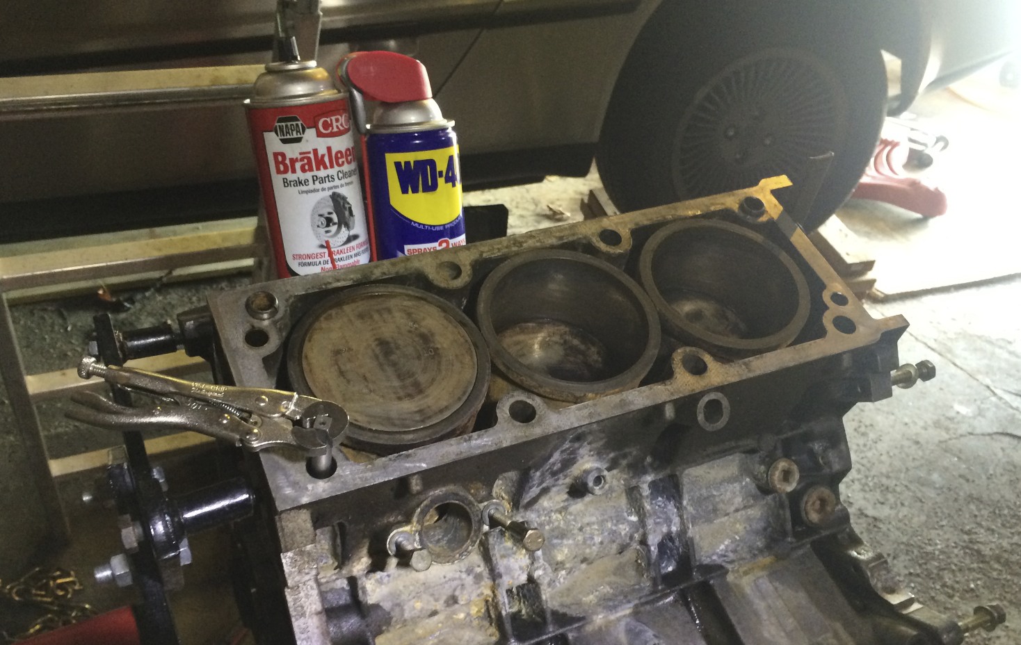 The tap is used with WD-40 and cleaned with brake cleaner. I forgot my T handle, so I used vice grips to run the tap.