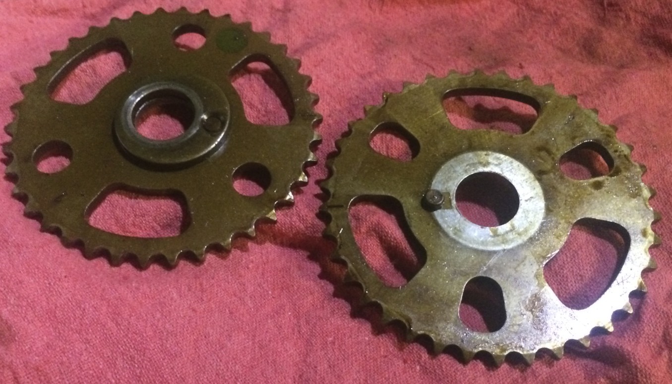 The driver's and passenger side sprockets are slightly different, with the driver's side one (left) having a built-in spacer.
