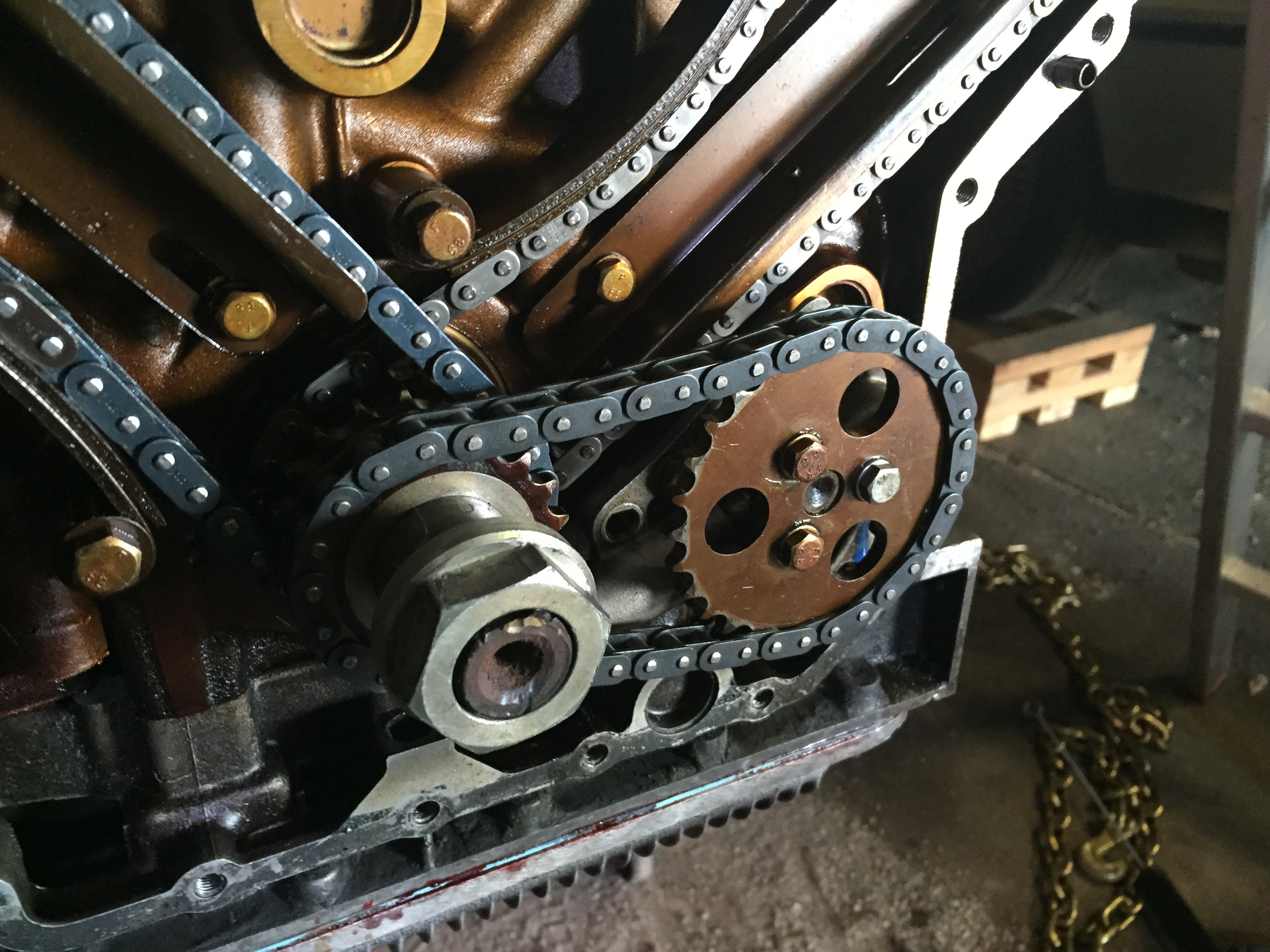 The oil pump, chain and sprocket reinstalled in the engine