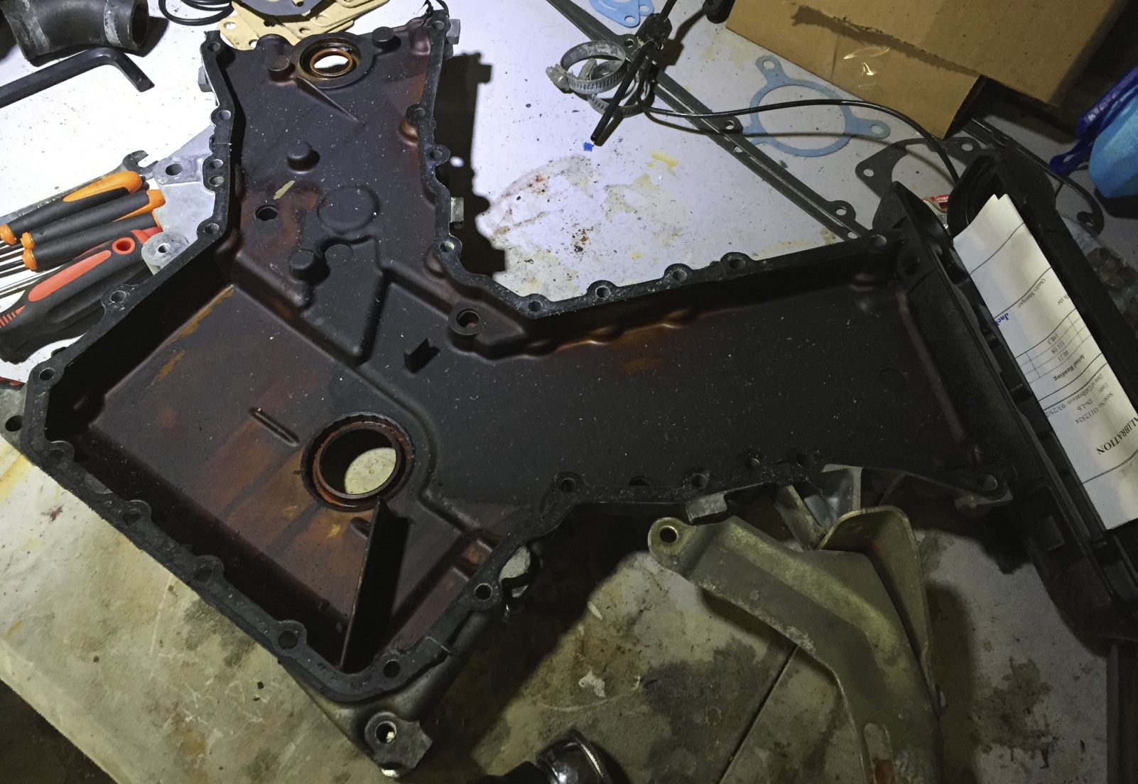 The timing cover before removing the gasket.