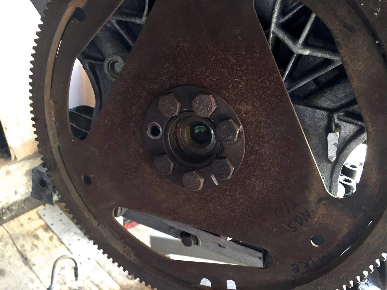 The flex plate mostly mounted to the crank. It seems I need to order another bolt, but for this test it'll be fine.