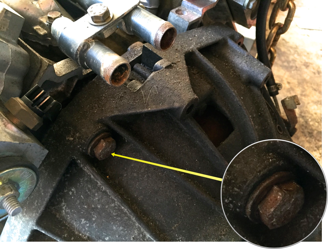 The first bolt installed after finally getting the alignment right.