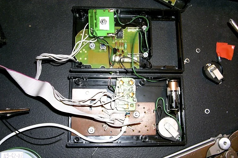 The remote control box, closed (top) and open (bottom). 