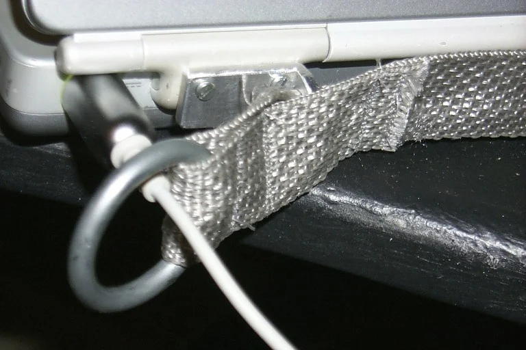 The right side mount showing the ring that the should strap attaches to.