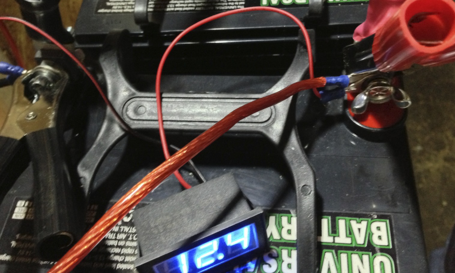 Batteries and power inverter connected to the each other.