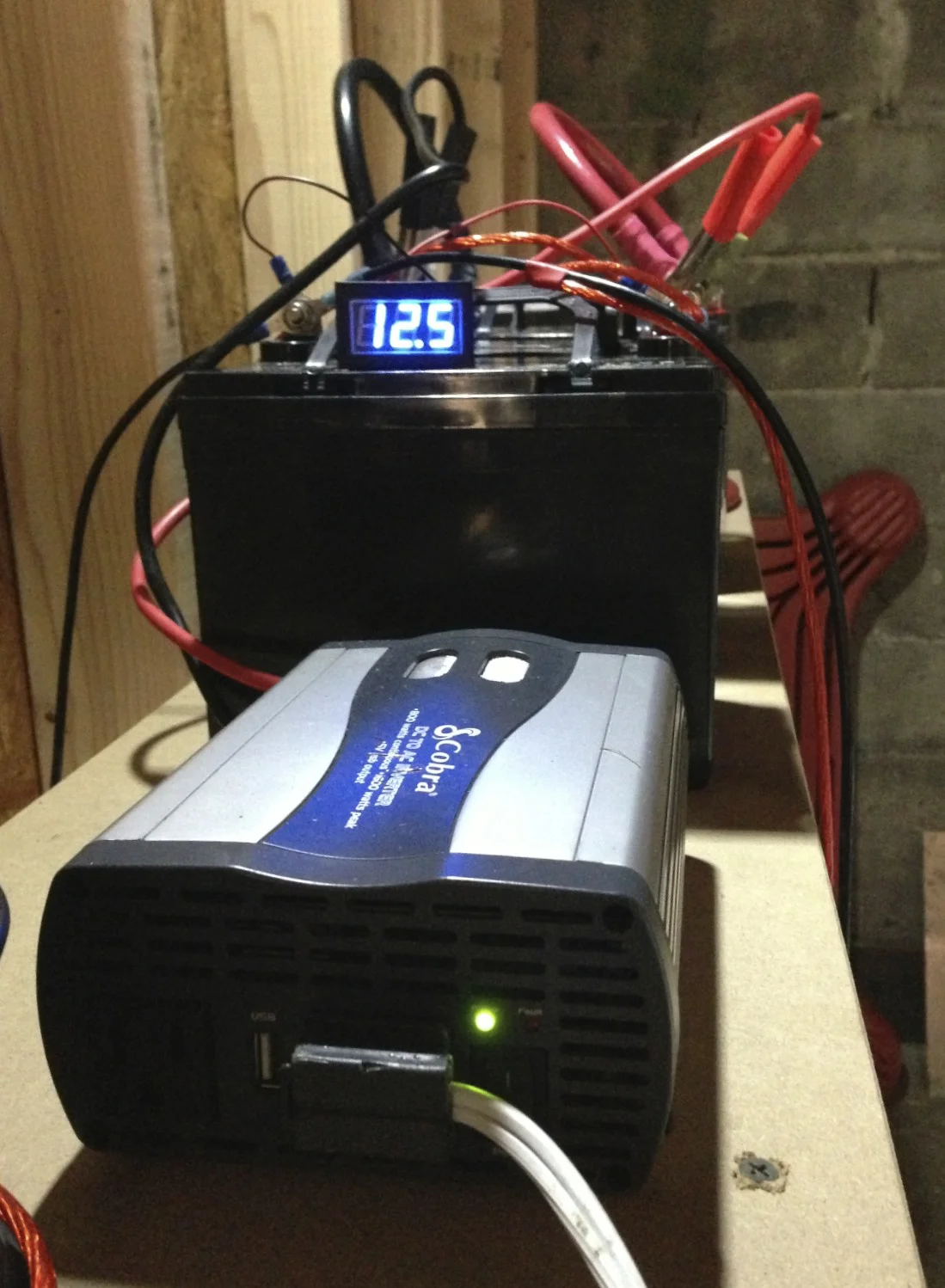 The power inverter connected to the batteries.