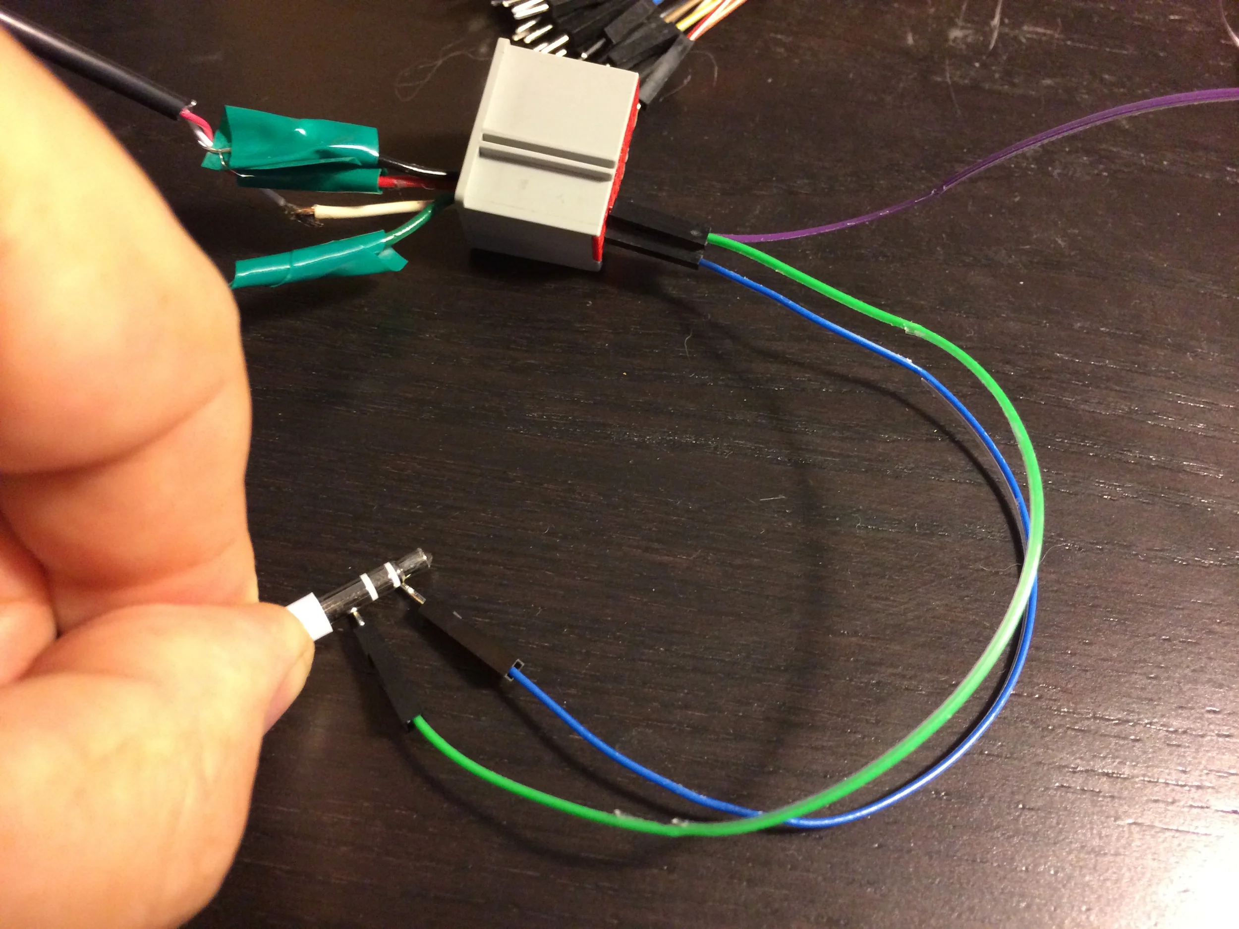 Testing the connection with headphones touching the relevant wires.
