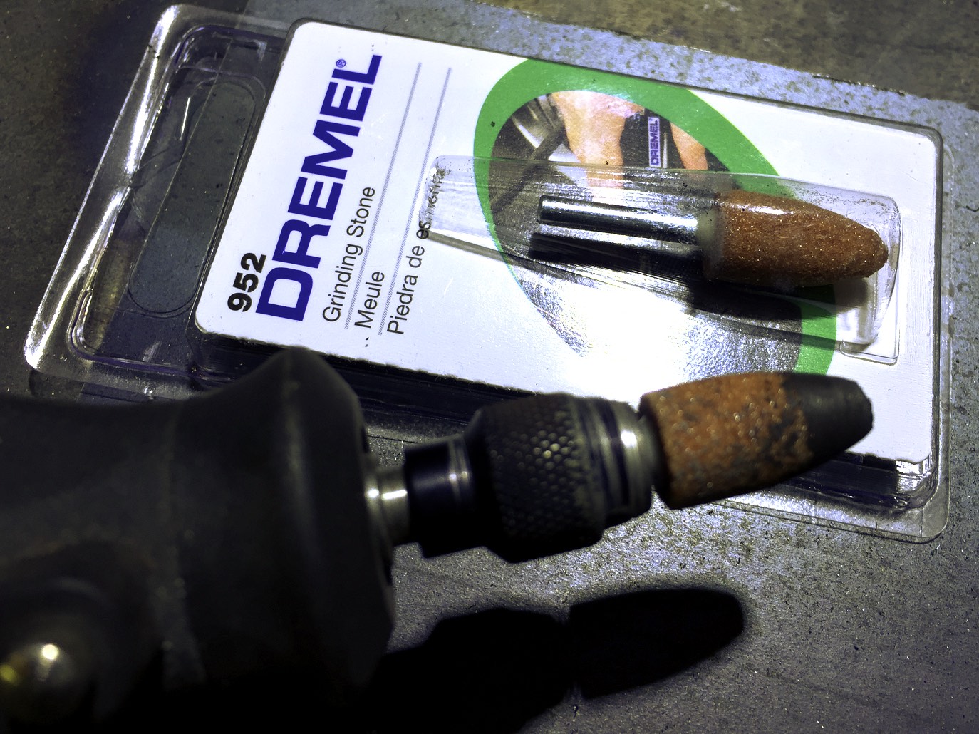 Dremel grinding stone used to remove hard-to-reach epoxy under the frame.