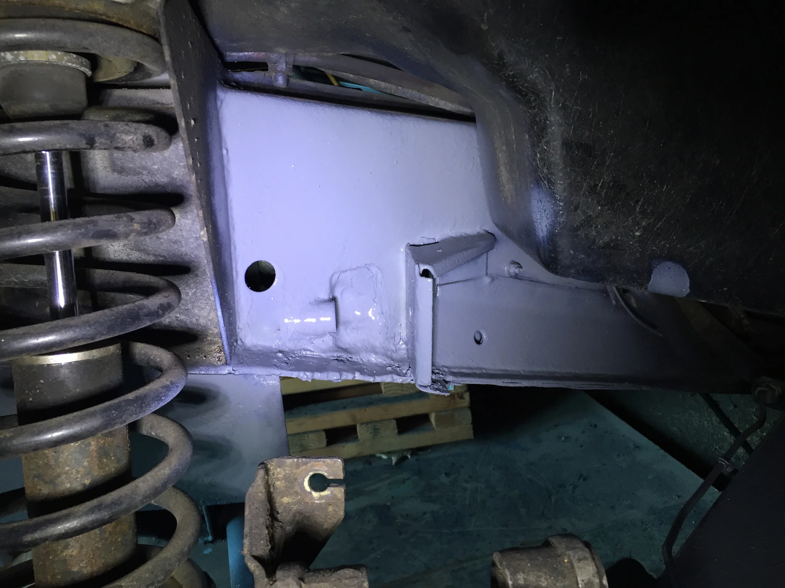 The control arm and more of the subframe after painting.