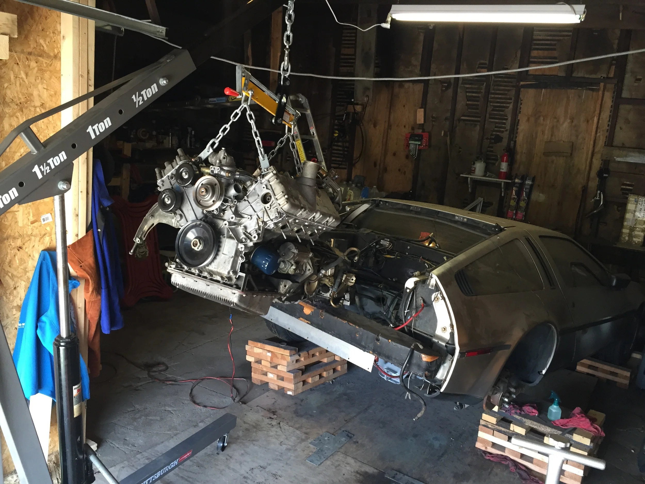 The engine lifted and ready to be installed.